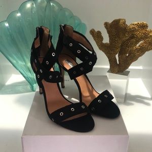 Beautiful sexy suede black heels with zip-up tassels. Never worn. Size 10